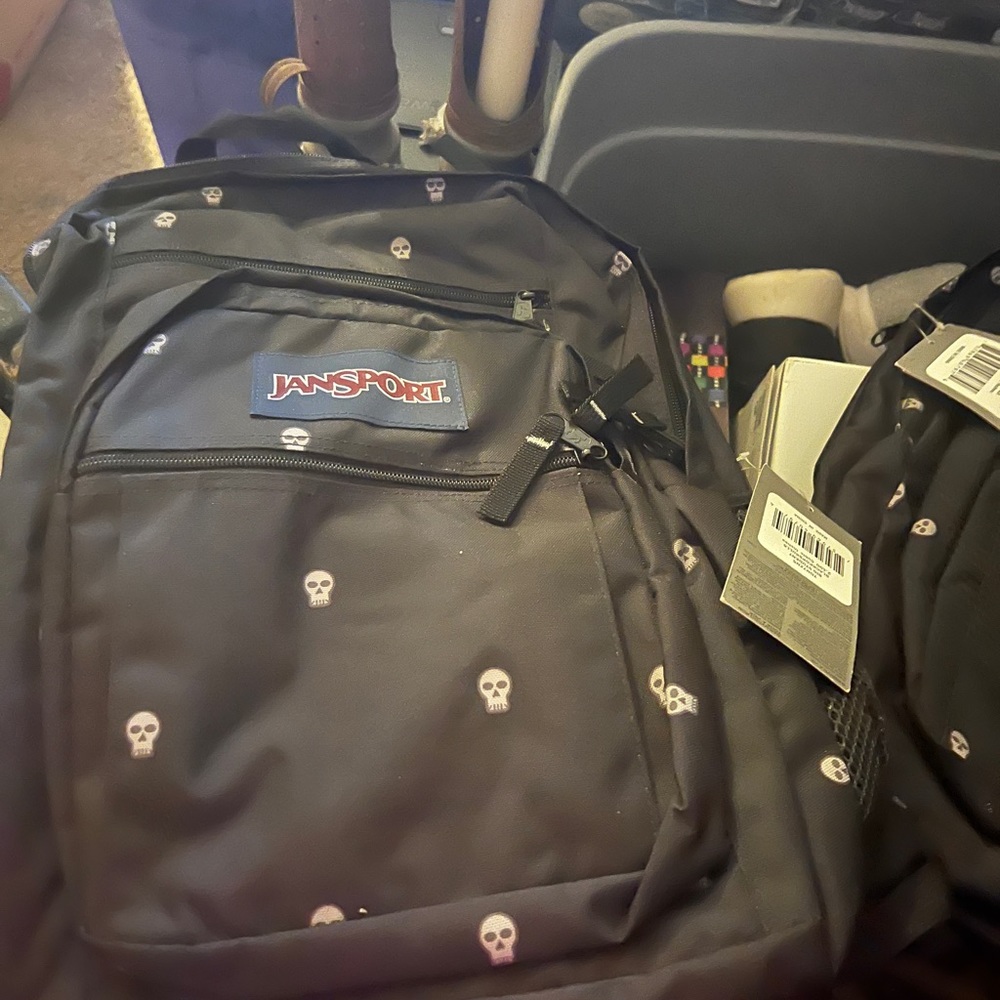 Jan’s port backpack nwt black with white skulls